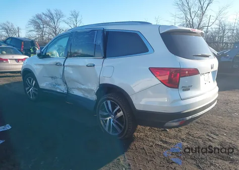 2018 Honda Pilot Touring z USA, uszkodzony, nr VIN 5FNYF6H90JB029797